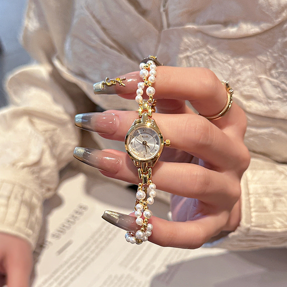 Mid-ancient Simple And Light Luxury Quartz Mini Round Elegant Steel Belt Casual Women's Watch